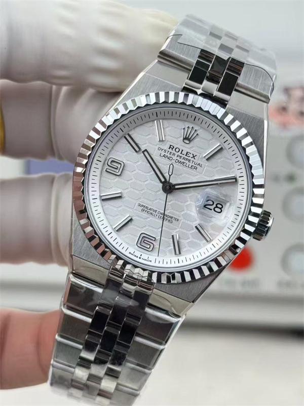 Rolex Land-Dweller 40 127334 Intense White Honeycomb Dial Fluted Bezel Flat Jubilee Bracelet Watch - الصورة 3