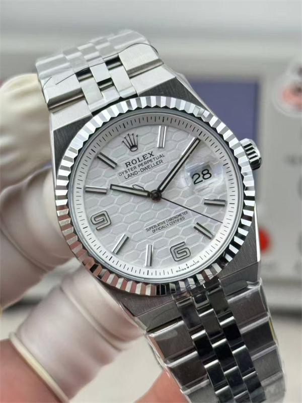 Rolex Land-Dweller 40 127334 Intense White Honeycomb Dial Fluted Bezel Flat Jubilee Bracelet Watch