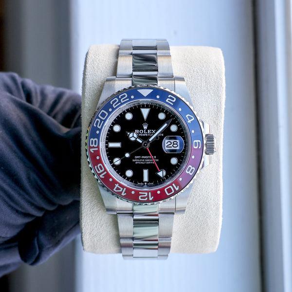 Rolex GMT-Master II Pepsi with Oyster bracelet on display cushion